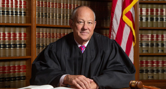 Judge Tymkovich Calls for Expansion of Federal Judiciary