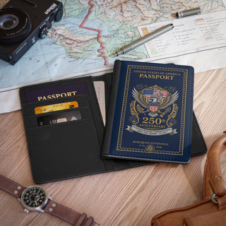 Two passports, a camera, pen, and map on a wooden surface
