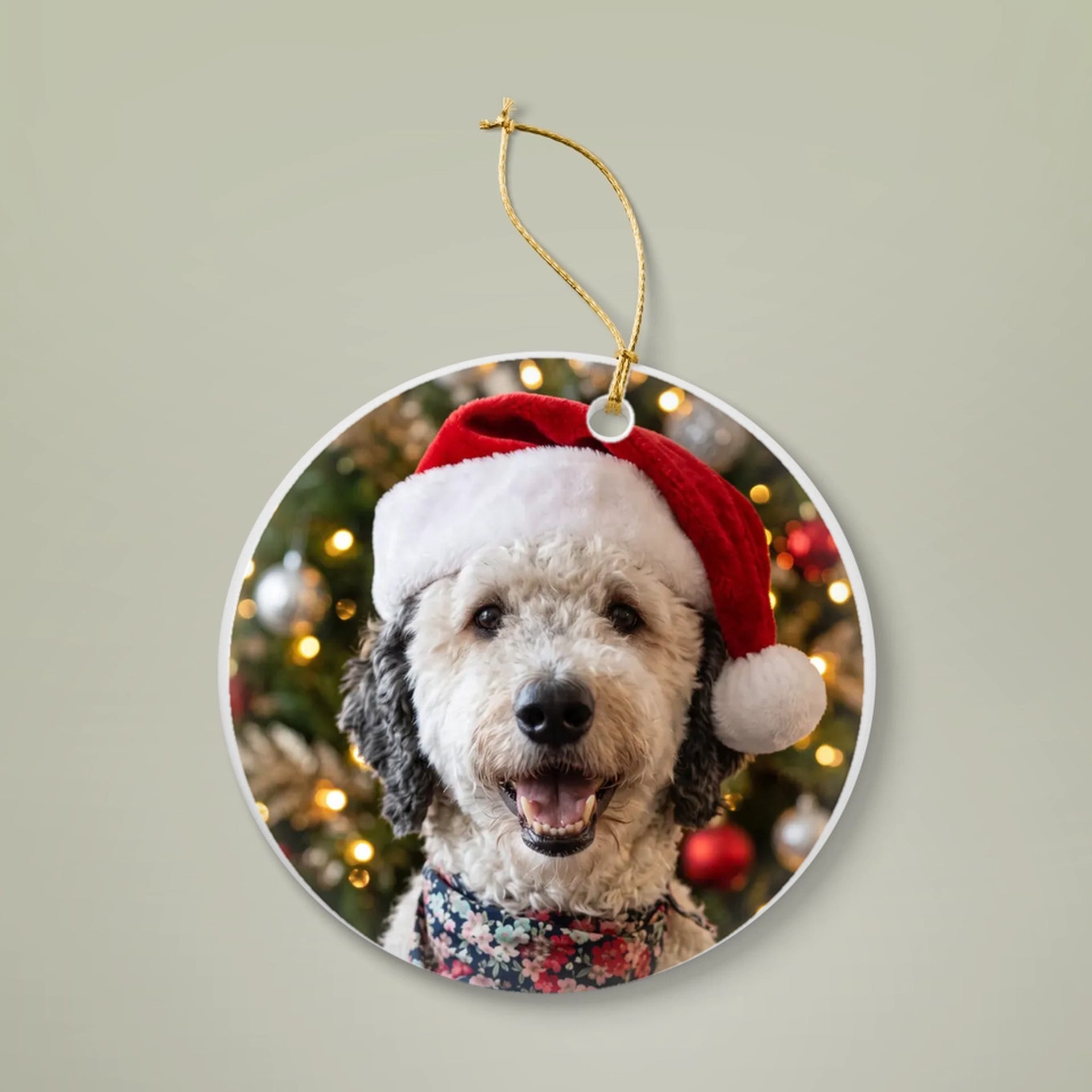 Santa Hat custom dog Christmas ornament: your dog in a red Santa hat in front of a Christmas tree