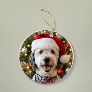 Santa Hat custom dog Christmas ornament: your dog in a red Santa hat in front of a Christmas tree