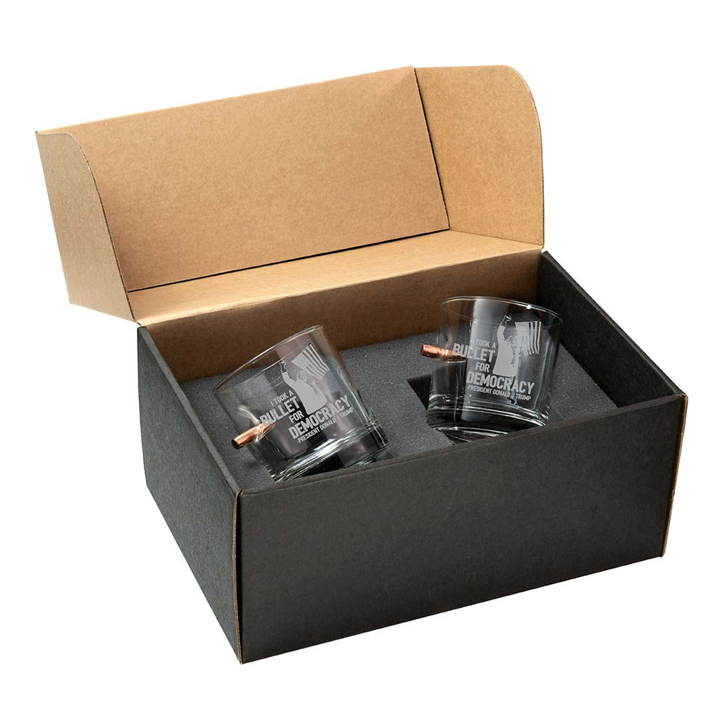 Trump whiskey glass set in a black gift box, featuring two glasses with "Bullet for Democracy" etched design.